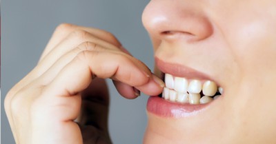 biting your nails is bad for your teeth